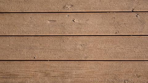 Closeup photo of brown wood siding